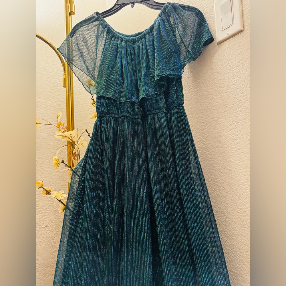Company: Mantra from Pakistan 
Product: Green dress
size: small/medium
